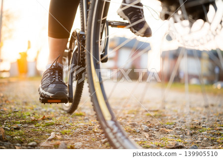 Bicycle Wheel With Female Foot On Pedals Bicycle Wheel With Female Foot On Pedals 139905510
