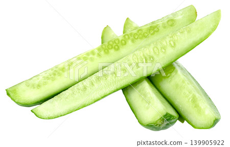 Fresh green cucumber slices and wedges isolated. Long longitudinal cuts of crisp organic vegetable showing seeds. Perfect for healthy eating or cooking concept. Fresh green cucumber slices and wedges isolated. Long longitudinal cuts of crisp organic vegetable showing seeds. Perfect for healthy eating or cooking concept. 139905922