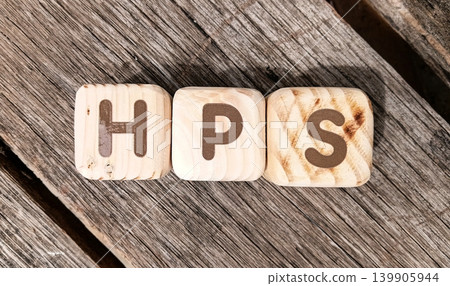 HPS Hantavirus Pulmonary Syndrome on a cube or wooden block. health concept HPS Hantavirus Pulmonary Syndrome on a cube or wooden block. health concept 139905944
