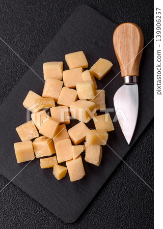 Parmesan cheese cubes for pasta, salads, and other Italian dishes. Parmesan cheese Parmesan cheese cubes for pasta, salads, and other Italian dishes. Parmesan cheese 139906257