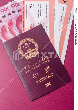 China, Chinese passport with money and flight tickets. Chinese passport China, Chinese passport with money and flight tickets. Chinese passport 139906259