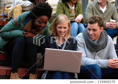 College, students and laptop on stairs outdoor for research, relax or break on campus with social media. University, friends or smile with technology for internet, streaming or learning and diversity College, students and laptop on stairs outdoor for research, relax or break on campus with social media. University, friends or smile with technology for internet, streaming or learning and diversity 139906570