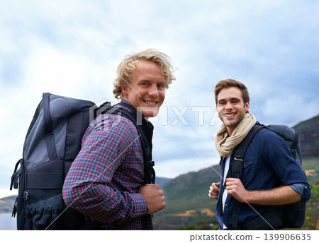 Happy man, portrait and friends with backpack for hiking mountain, travel or sightseeing on outdoor journey in nature. Male person or young hikers with bag on back for trekking, fitness or adventure Happy man, portrait and friends with backpack for hiking mountain, travel or sightseeing on outdoor journey in nature. Male person or young hikers with bag on back for trekking, fitness or adventure 139906635