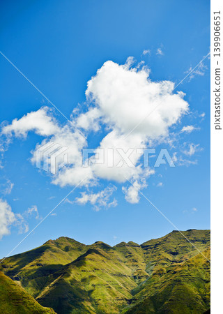 Sky, clouds and mountains for landscape background, environment and eco friendly nature in Europe. Aerial view of countryside, hill and river for green land, sustainability or summer weather in italy Sky, clouds and mountains for landscape background, environment and eco friendly nature in Europe. Aerial view of countryside, hill and river for green land, sustainability or summer weather in italy 139906651