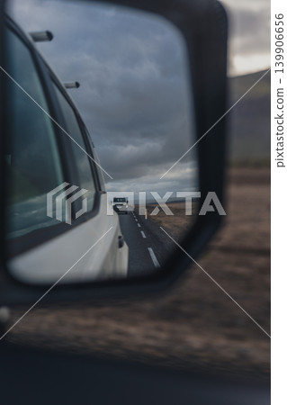 Reflection of a Vehicle on a Remote Icelandic Road in Overcast Light Reflection of a Vehicle on a Remote Icelandic Road in Overcast Light 139906656
