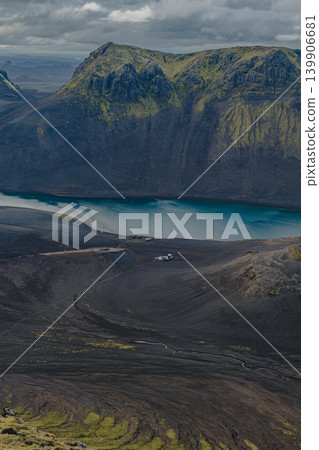 Turquoise Lake Amid Basaltic Hills in Volcanic Icelandic Landscape Turquoise Lake Amid Basaltic Hills in Volcanic Icelandic Landscape 139906681