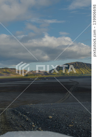 Rugged Icelandic Landscape with Dirt Track and Rocky Hill Rugged Icelandic Landscape with Dirt Track and Rocky Hill 139906698