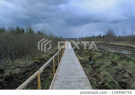 Wooden Boardwalk in Wetland Area of Yelnya Nature Reserve, Belarus Wooden Boardwalk in Wetland Area of Yelnya Nature Reserve, Belarus 139906750