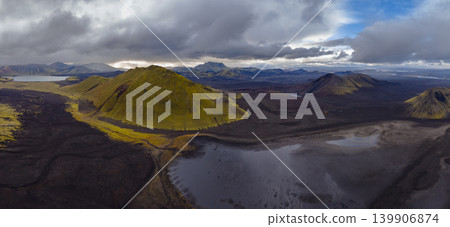 Aerial View of Moss Covered Volcanic Hill in Iceland's Rugged Terrain Aerial View of Moss Covered Volcanic Hill in Iceland's Rugged Terrain 139906874