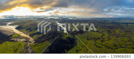 Aerial View of Iceland's River, Volcanic Hills, and Green Valleys Aerial View of Iceland's River, Volcanic Hills, and Green Valleys 139906893