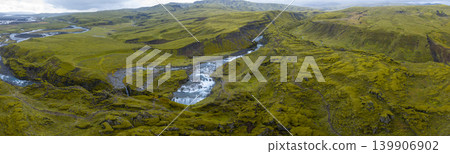 Aerial View of Icelandic Waterfall in Moss Covered Canyon Aerial View of Icelandic Waterfall in Moss Covered Canyon 139906902