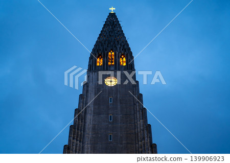 Hallgrimskirkja Church Illuminated Against Evening Sky in Reykjavik Hallgrimskirkja Church Illuminated Against Evening Sky in Reykjavik 139906923