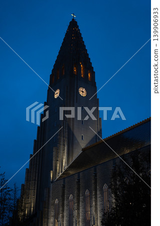 Hallgrimskirkja Church Tower Illuminated Against Evening Sky Hallgrimskirkja Church Tower Illuminated Against Evening Sky 139906933