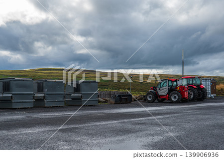 Gravel Lot with Waste Containers and Tractors in Rural Iceland Gravel Lot with Waste Containers and Tractors in Rural Iceland 139906936