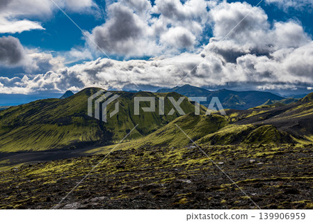 Moss Covered Hills and Volcanic Terrain in Icelandic Landscape 139906959