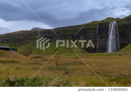 Seljalandsfoss Waterfall Cascading from Moss Covered Cliff in Iceland 139906962