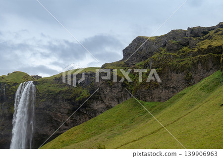 Seljalandsfoss Waterfall Cascading from Cliff in Iceland Seljalandsfoss Waterfall Cascading from Cliff in Iceland 139906963