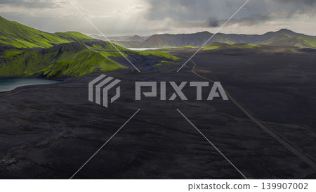 Aerial View of Iceland's Volcanic Landscape with Moss Covered Hills Aerial View of Iceland's Volcanic Landscape with Moss Covered Hills 139907002
