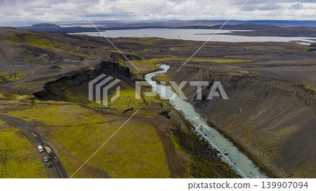 Aerial View of Iceland's Volcanic Landscape with River and Lake Aerial View of Iceland's Volcanic Landscape with River and Lake 139907094