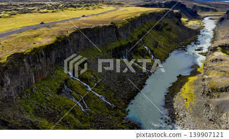 Aerial View of a Canyon with Waterfalls and River in Iceland Aerial View of a Canyon with Waterfalls and River in Iceland 139907121