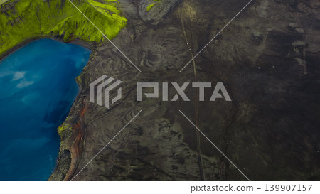 Aerial View of Volcanic Landscape with Blue Lake in Iceland 139907157