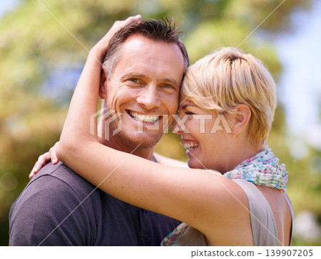 Hug, laugh or portrait of couple in nature with love, trust and support, security or solidarity outdoor. Happy, face and people embrace in a park for bonding, care or romantic date in London together Hug, laugh or portrait of couple in nature with love, trust and support, security or solidarity outdoor. Happy, face and people embrace in a park for bonding, care or romantic date in London together 139907205