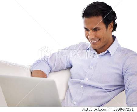 Remote work, laptop and happy businessman on a sofa for web, research or client communication. Freelance, pc or real estate agent online in show house living room for property, appointment or meeting 139907251