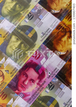 Switzerland, Swiss franc paper money and coins, financing and commodity exchange. Swiss currency Switzerland, Swiss franc paper money and coins, financing and commodity exchange. Swiss currency 139907403