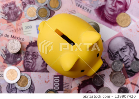A piggy bank as a concept for storing, accumulating, and saving financial resources. A piggy bank A piggy bank as a concept for storing, accumulating, and saving financial resources. A piggy bank 139907420