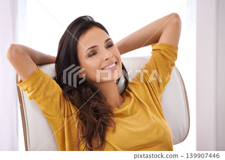Woman, relax and smile on work break in a chair in a home with rest and calm in a lounge with rest. Happy, chill and female creative freelancer and idea in the morning sitting with peace and thinking Woman, relax and smile on work break in a chair in a home with rest and calm in a lounge with rest. Happy, chill and female creative freelancer and idea in the morning sitting with peace and thinking 139907446
