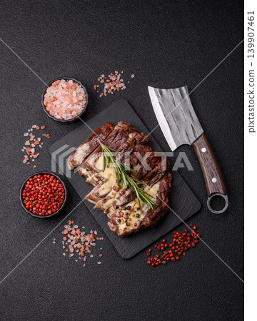 Steak, beef or pork meat grilled or barbecued with salt and spices. Beef steak Steak, beef or pork meat grilled or barbecued with salt and spices. Beef steak 139907461