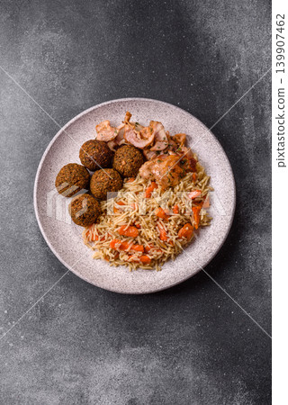 Kabsa or mandi, an Arabic dish with rice and chicken, salt, and spices. Kabsa or mandi Kabsa or mandi, an Arabic dish with rice and chicken, salt, and spices. Kabsa or mandi 139907462