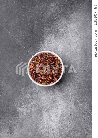 Dry herbal or fruit tea with flower petals and aromatic additives. Dry fruit herbal tea Dry herbal or fruit tea with flower petals and aromatic additives. Dry fruit herbal tea 139907469