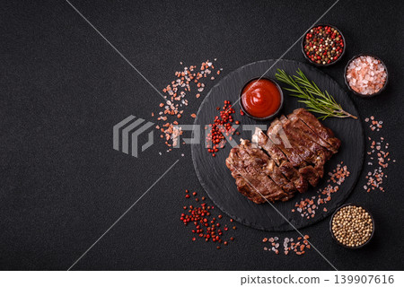 Steak, beef or pork meat grilled or barbecued with salt and spices. Beef steak Steak, beef or pork meat grilled or barbecued with salt and spices. Beef steak 139907616