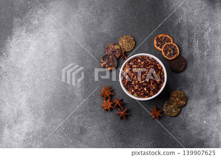 Dry herbal or fruit tea with flower petals and aromatic additives. Dry fruit herbal tea Dry herbal or fruit tea with flower petals and aromatic additives. Dry fruit herbal tea 139907625