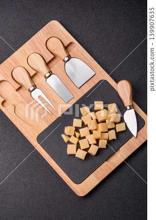 Parmesan cheese cubes for pasta, salads, and other Italian dishes. Parmesan cheese Parmesan cheese cubes for pasta, salads, and other Italian dishes. Parmesan cheese 139907635