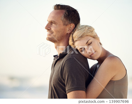 Couple, beach and holiday hug for outdoor bonding in California or travel commitment, love or together. Man, woman and embrace for sea vacation or relax in nature for relationship, sunset or summer Couple, beach and holiday hug for outdoor bonding in California or travel commitment, love or together. Man, woman and embrace for sea vacation or relax in nature for relationship, sunset or summer 139907696
