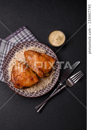 Kabsa or haneeth, an Arabic dish with rice and chicken, salt, and spices. Kabsa or haneeth Kabsa or haneeth, an Arabic dish with rice and chicken, salt, and spices. Kabsa or haneeth 139907745