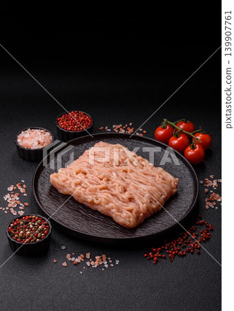 Raw fresh ground chicken, turkey, or pork for burgers or meatballs. Raw ground chicken Raw fresh ground chicken, turkey, or pork for burgers or meatballs. Raw ground chicken 139907761