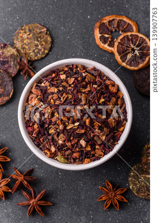 Dry herbal or fruit tea with flower petals and aromatic additives. Dry fruit herbal tea Dry herbal or fruit tea with flower petals and aromatic additives. Dry fruit herbal tea 139907763