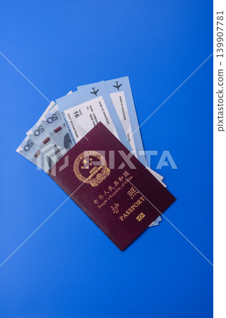 China, Chinese passport with money and flight tickets. Chinese passport China, Chinese passport with money and flight tickets. Chinese passport 139907781