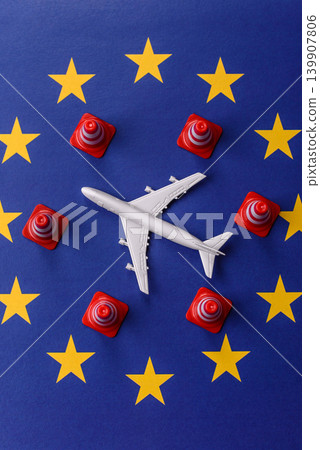 A mock up of airplane with no fly signs on a US flag as a concept for a flight ban A mock up of airplane with no fly signs on a US flag as a concept for a flight ban 139907806