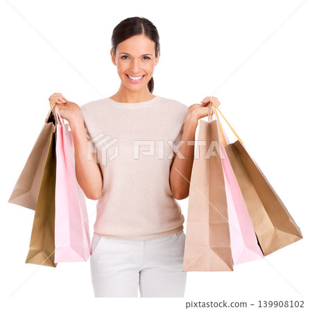 Woman, portrait and shopping bags for retail deal or customer discount, promotion or giveaway. Female person, face and sale product in studio on white background for purchase, gift or mockup space 139908102