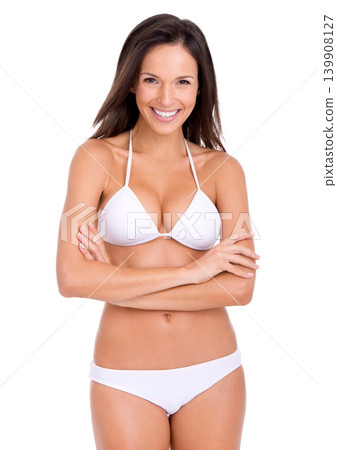 Woman, portrait and smile in bikini for fashion and beauty, poolside style with cosmetics and skin on white background. Healthy glow, wellness with model in beach wear or underwear with arms crossed Woman, portrait and smile in bikini for fashion and beauty, poolside style with cosmetics and skin on white background. Healthy glow, wellness with model in beach wear or underwear with arms crossed 139908127
