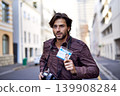 Photographer, journalist and news with man in city for running, press badge and paparazzi. Reporter, story and pictures with person and camera in urban outdoors for announcement and investigation 139908284