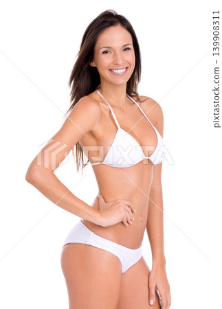 Confident, model and portrait in bikini for fashion on studio, white background and mock up. Swimwear, woman and girl in underwear with beauty for vacation or style for holiday with happiness Confident, model and portrait in bikini for fashion on studio, white background and mock up. Swimwear, woman and girl in underwear with beauty for vacation or style for holiday with happiness 139908311