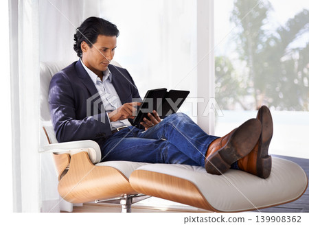 Remote work from home, relax and man with tablet, typing and connection with website information or digital app. Person, entrepreneur or copywriter with internet or research with professional or tech 139908362