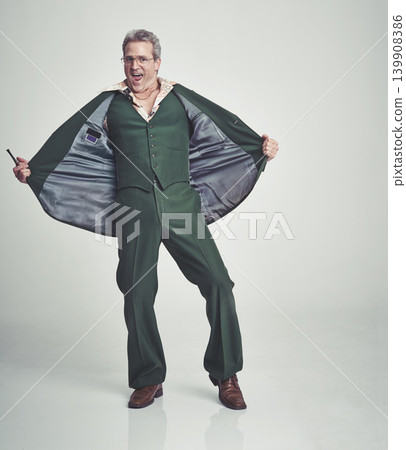 Portrait, senior and happy man in fashion for style or business outfit on a gray studio background. Mature, male person or model posing with smile in formal or green vintage clothing on mockup space Portrait, senior and happy man in fashion for style or business outfit on a gray studio background. Mature, male person or model posing with smile in formal or green vintage clothing on mockup space 139908386