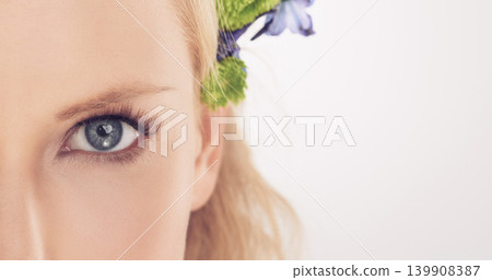 Woman, flowers and half face in studio with beauty, makeup or cosmetics with eyelash extensions on mockup space. Model, person and portrait with collagen, skincare or glowing skin on white background Woman, flowers and half face in studio with beauty, makeup or cosmetics with eyelash extensions on mockup space. Model, person and portrait with collagen, skincare or glowing skin on white background 139908387