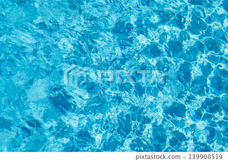 background of blue water in a swimming pool top view background of blue water in a swimming pool top view 139908519
